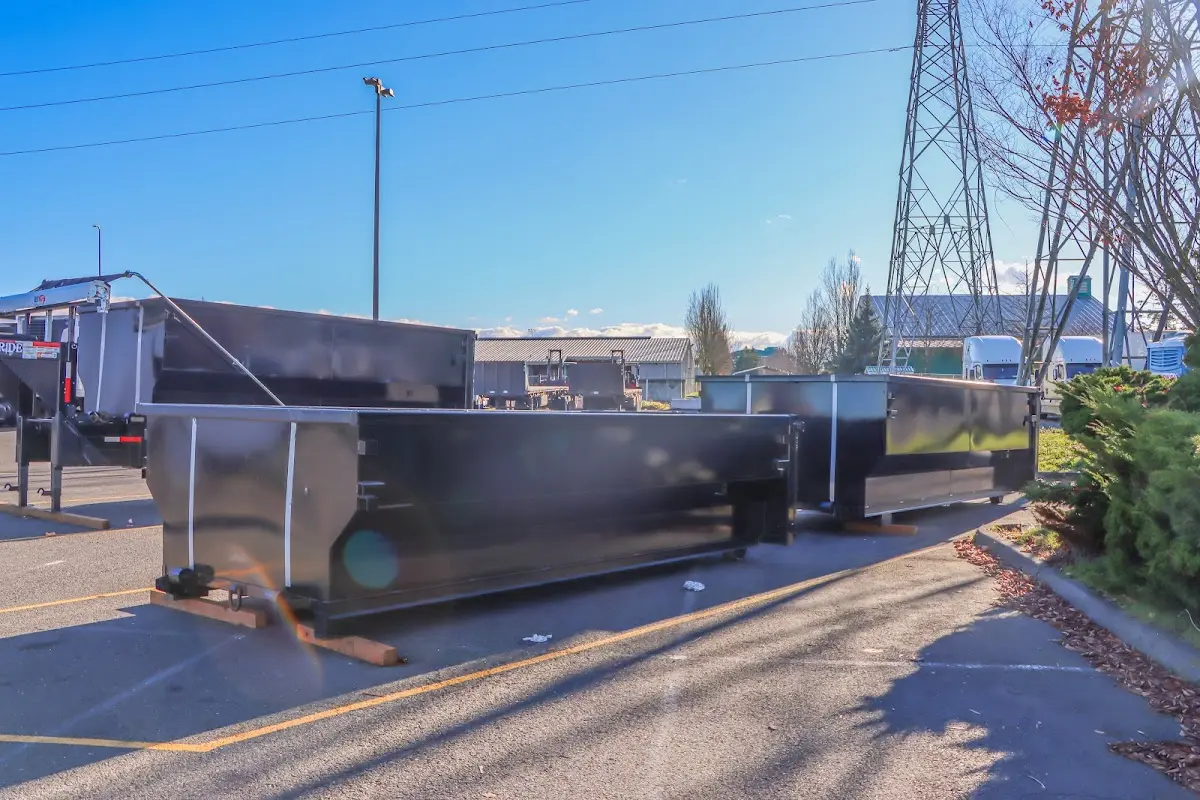 Roll-off dumpster ready for waste disposal at job site for Yard Waste Dumpster Rental in Wildwood